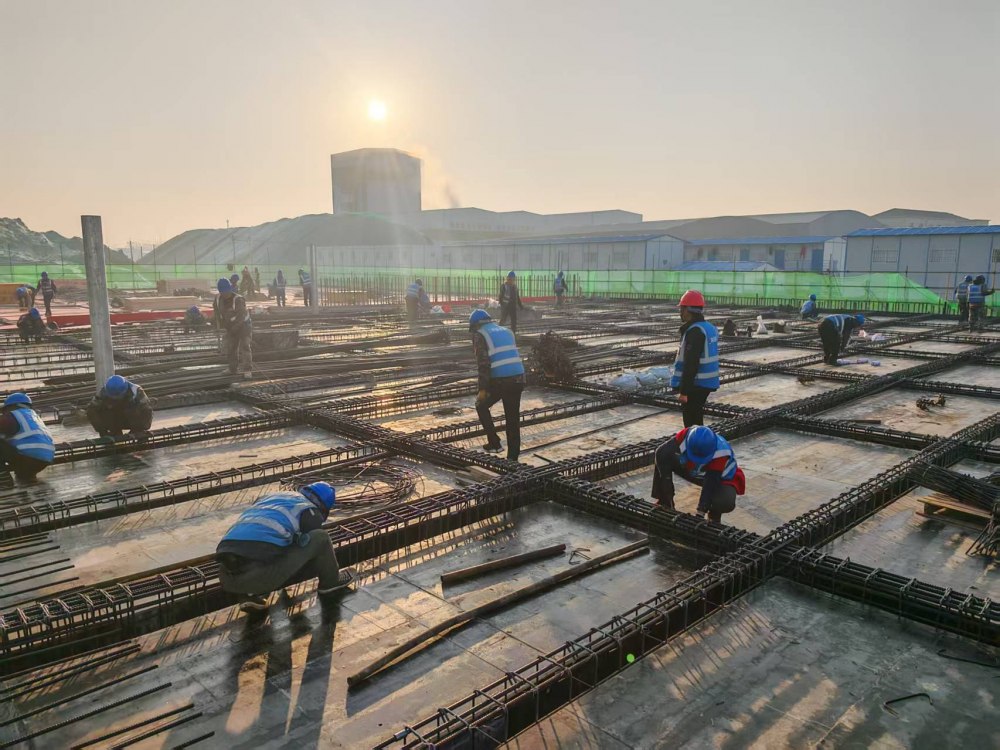 奮戰(zhàn)十八晝夜，澆筑信陽新篇章